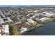 Wide aerial view of condo community by lake at 11485 Oakhurst Rd # A301, Largo, FL 33774