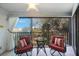 Peaceful balcony featuring comfortable seating and scenic views at 11485 Oakhurst Rd # A301, Largo, FL 33774