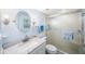 Bright bathroom with a shower/tub combo and granite vanity at 11485 Oakhurst Rd # A301, Largo, FL 33774