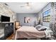 Main bedroom with brick accent wall and ample closet space at 1232 Calamondin Dr, Holiday, FL 34691