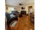 Living room with hardwood floors and a fireplace at 14655 Pine Glen Cir, Lutz, FL 33559