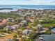 Aerial view showing home's waterfront location and surrounding neighborhood at 1538 Riverside Dr, Tarpon Springs, FL 34689