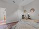 Bright bedroom with a view and access to upper floor at 1538 Riverside Dr, Tarpon Springs, FL 34689