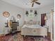 Elegant bedroom with ornate bed and stylish decor at 1538 Riverside Dr, Tarpon Springs, FL 34689