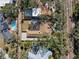 Bird's eye view of home, pool, and surrounding trees at 1621 Park N St, St Petersburg, FL 33710