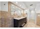 Bathroom features a dark vanity, granite countertop, and tile flooring at 1621 Park N St, St Petersburg, FL 33710