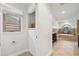 Bathroom with double vanity, soaking tub, and walk-in shower at 1621 Park N St, St Petersburg, FL 33710