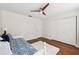 Bright bedroom with hardwood floors, double doors, and a day bed at 1621 Park N St, St Petersburg, FL 33710