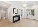 Bright entryway with hardwood floors, chandelier, and French doors at 1621 Park N St, St Petersburg, FL 33710