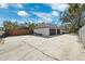 Three-car garage with dark brown doors and ample space at 1621 Park N St, St Petersburg, FL 33710