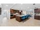 Modern kitchen boasts a large island with seating and stainless steel appliances at 1621 Park N St, St Petersburg, FL 33710