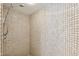 Small shower with beige tile surround at 1621 Park N St, St Petersburg, FL 33710