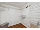 Large walk-in closet with wire shelving and ample storage space at 1621 Park N St, St Petersburg, FL 33710