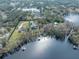 Bird's-eye view of property, showcasing lakefront location at 16320 Rock Lake Dr, Odessa, FL 33556