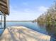 Spacious lakefront dock with a swim ladder at 16320 Rock Lake Dr, Odessa, FL 33556