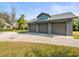 Detached garage with three car spaces and extra storage at 16320 Rock Lake Dr, Odessa, FL 33556