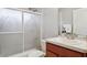 Bathroom featuring a vanity with a sink, sliding shower doors, and a toilet at 1642 Daylily Dr, Trinity, FL 34655