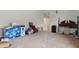 Empty bedroom featuring carpet, a ceiling fan, and some furniture at 1642 Daylily Dr, Trinity, FL 34655