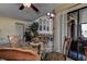 Dining area with glass-top table and chairs, kitchen view at 170 Eric Ct, Oldsmar, FL 34677