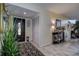 Inviting entryway with tile flooring and a decorative console table at 170 Eric Ct, Oldsmar, FL 34677