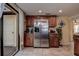 Kitchen boasts stainless steel appliances and ample wood cabinetry at 170 Eric Ct, Oldsmar, FL 34677