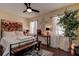 Serene main bedroom with a comfortable bed and decorative wall art at 170 Eric Ct, Oldsmar, FL 34677