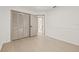 Bright bedroom with light flooring and built-in closet at 1741 Spinning Wheel Dr, Lutz, FL 33559