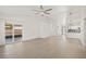 Open living area with views into kitchen and entryway at 1741 Spinning Wheel Dr, Lutz, FL 33559