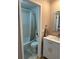 Clean bathroom with white vanity and tub shower at 1799 N Highland Ave # 38, Clearwater, FL 33755