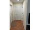 Bright entryway with tile flooring and storage at 1799 N Highland Ave # 38, Clearwater, FL 33755