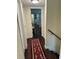 Hallway with dark hardwood floors and access to bedrooms at 1799 N Highland Ave # 38, Clearwater, FL 33755