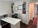 Home office with built-in shelving and desk at 1799 N Highland Ave # 38, Clearwater, FL 33755