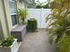 Small patio with storage and greenery at 1799 N Highland Ave # 38, Clearwater, FL 33755