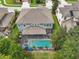 Aerial view of home with pool and cabana at 19322 Autumn Chase Ct, Land O Lakes, FL 34638