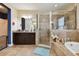 Bathroom with soaking tub, walk-in shower, and double vanity at 19322 Autumn Chase Ct, Land O Lakes, FL 34638