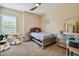 Bedroom with a twin bed, dresser, and plush toys at 19322 Autumn Chase Ct, Land O Lakes, FL 34638