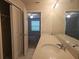 Bathroom with double vanity, large mirror, and separate shower at 19639 Shady Oak Dr, Land O Lakes, FL 34638