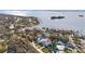 Aerial showing home's location on a canal, close to the bay at 1964 Cedar Dr, Dunedin, FL 34698