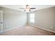 Bedroom with window, ceiling fan and neutral walls at 20209 Merry Oak Ave, Tampa, FL 33647