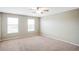 Bright bedroom featuring neutral walls and carpet at 20209 Merry Oak Ave, Tampa, FL 33647