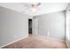 Bright bedroom featuring ceiling fan and carpet at 20209 Merry Oak Ave, Tampa, FL 33647