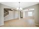 Bright dining room with chandelier and open floor plan at 20209 Merry Oak Ave, Tampa, FL 33647