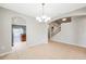 Bright dining room with chandelier and open floor plan at 20209 Merry Oak Ave, Tampa, FL 33647