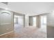 Spacious hallway with carpeted floor and access to bedrooms at 20209 Merry Oak Ave, Tampa, FL 33647