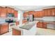 Spacious kitchen with ample cabinetry and granite countertops at 20209 Merry Oak Ave, Tampa, FL 33647