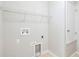 Laundry room with shelving and hookups for washer/dryer at 20209 Merry Oak Ave, Tampa, FL 33647