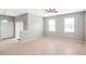 Open living room with tile flooring and ceiling fan at 20209 Merry Oak Ave, Tampa, FL 33647