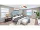 Spacious main bedroom with water views and plush bedding at 20209 Merry Oak Ave, Tampa, FL 33647