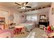 bedroom with full bed and play area at 20490 Pinewood Dairy Rd, Brooksville, FL 34601