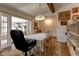 Bright dining room with table, chairs, and built-in shelving at 20490 Pinewood Dairy Rd, Brooksville, FL 34601